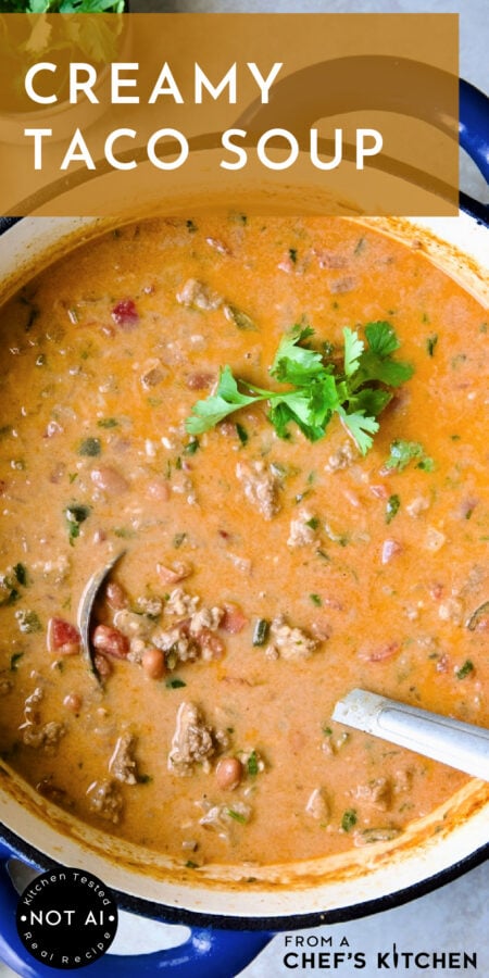 Pinterest graphic for Creamy Taco Soup showing it in a blue enamel Dutch oven with soup ladle.