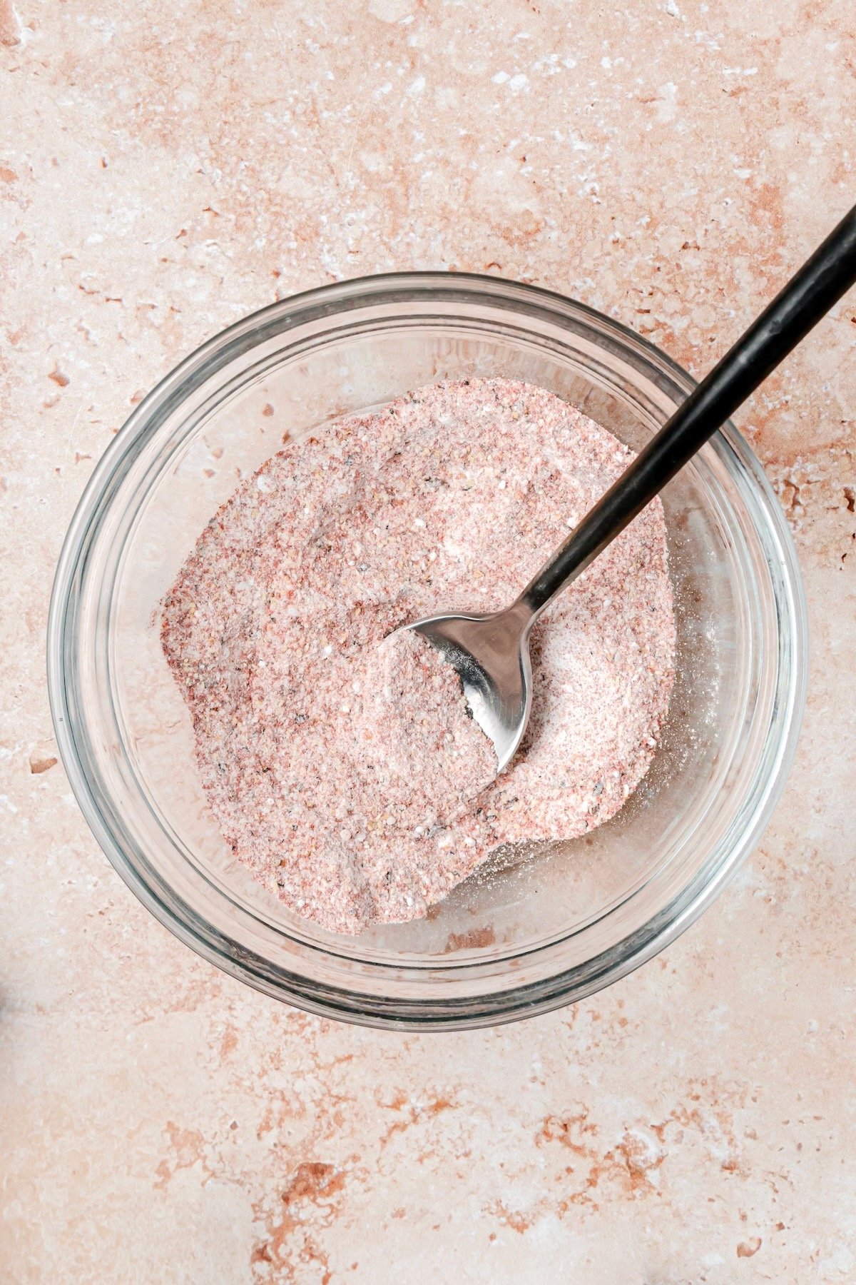 Ingredients for Hot Honey Chicken Wings rub in glass bowl after being combined.
