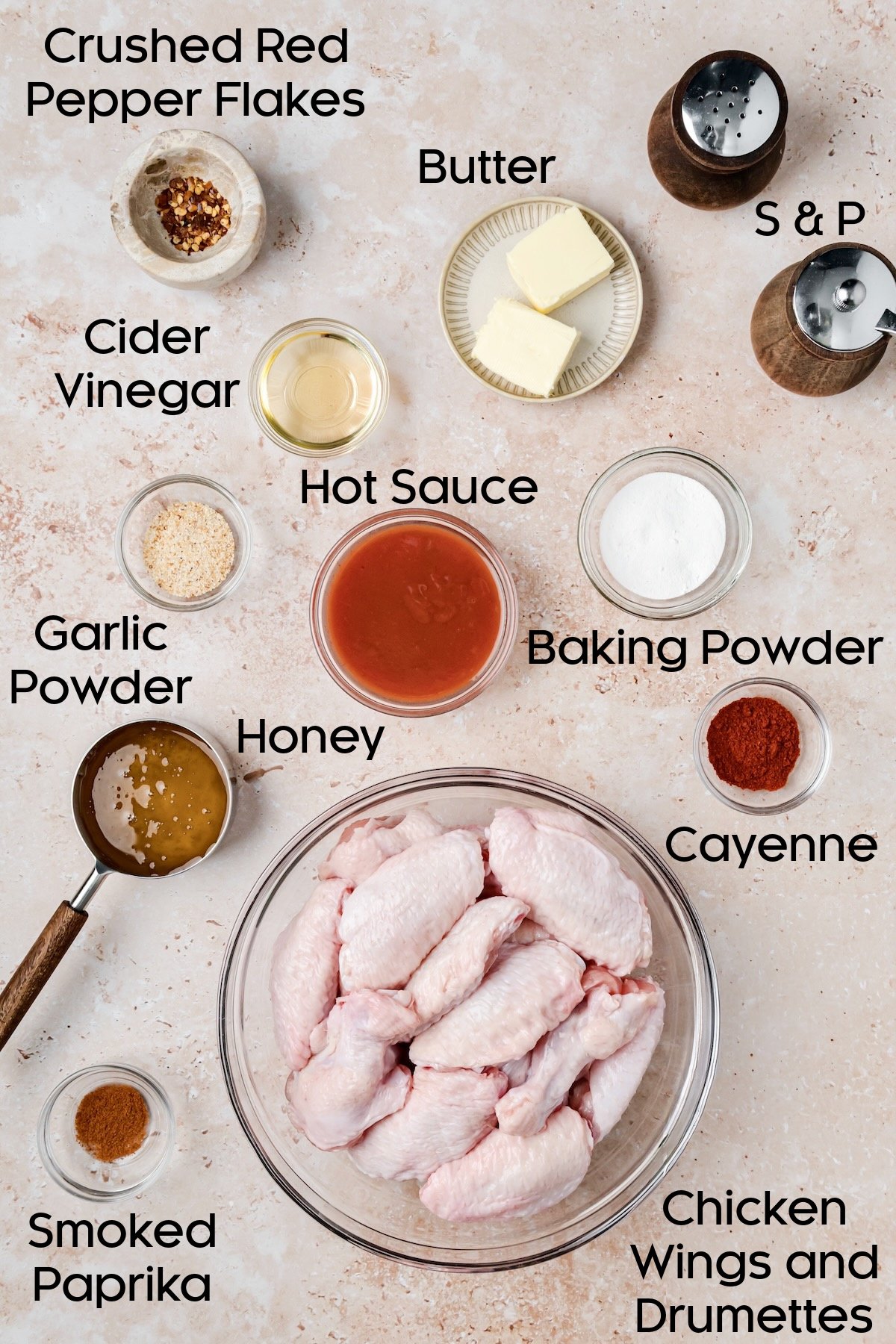 Ingredients for Hot Honey Chicken Wings in glass bowls.