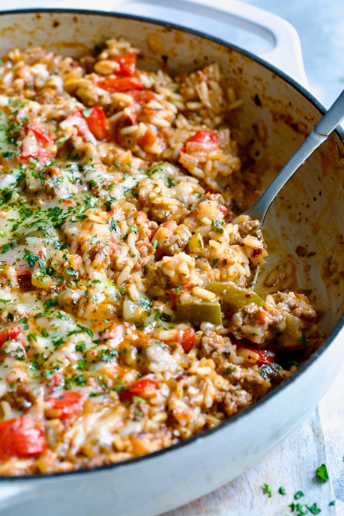 Unstuffed Peppers Skillet in white enamel cast iron skillet.