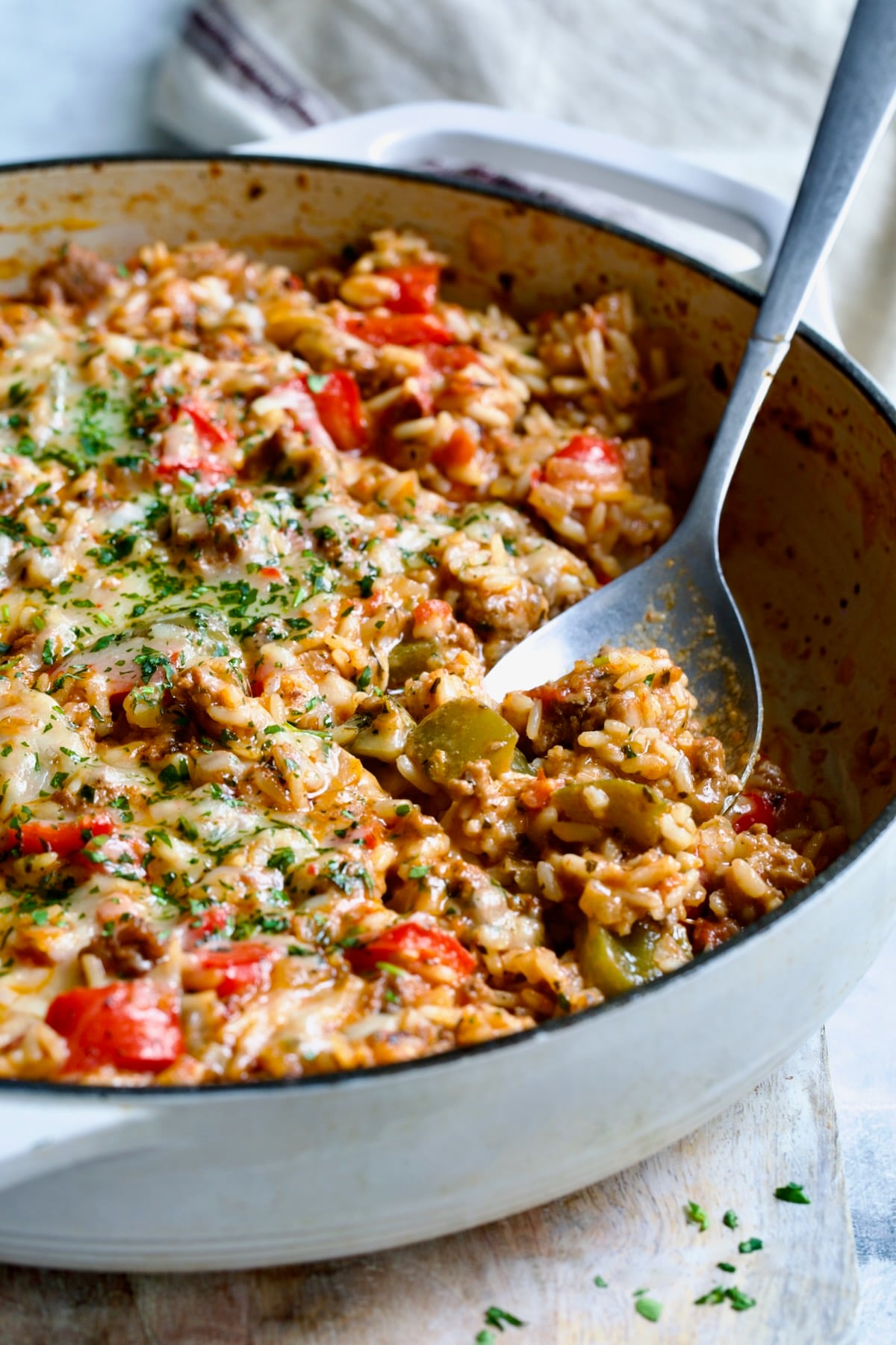 Unstuffed Peppers Skillet in white enamel cast iron skillet.