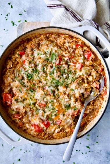 Unstuffed Peppers Skillet in white enamel cast iron skillet.