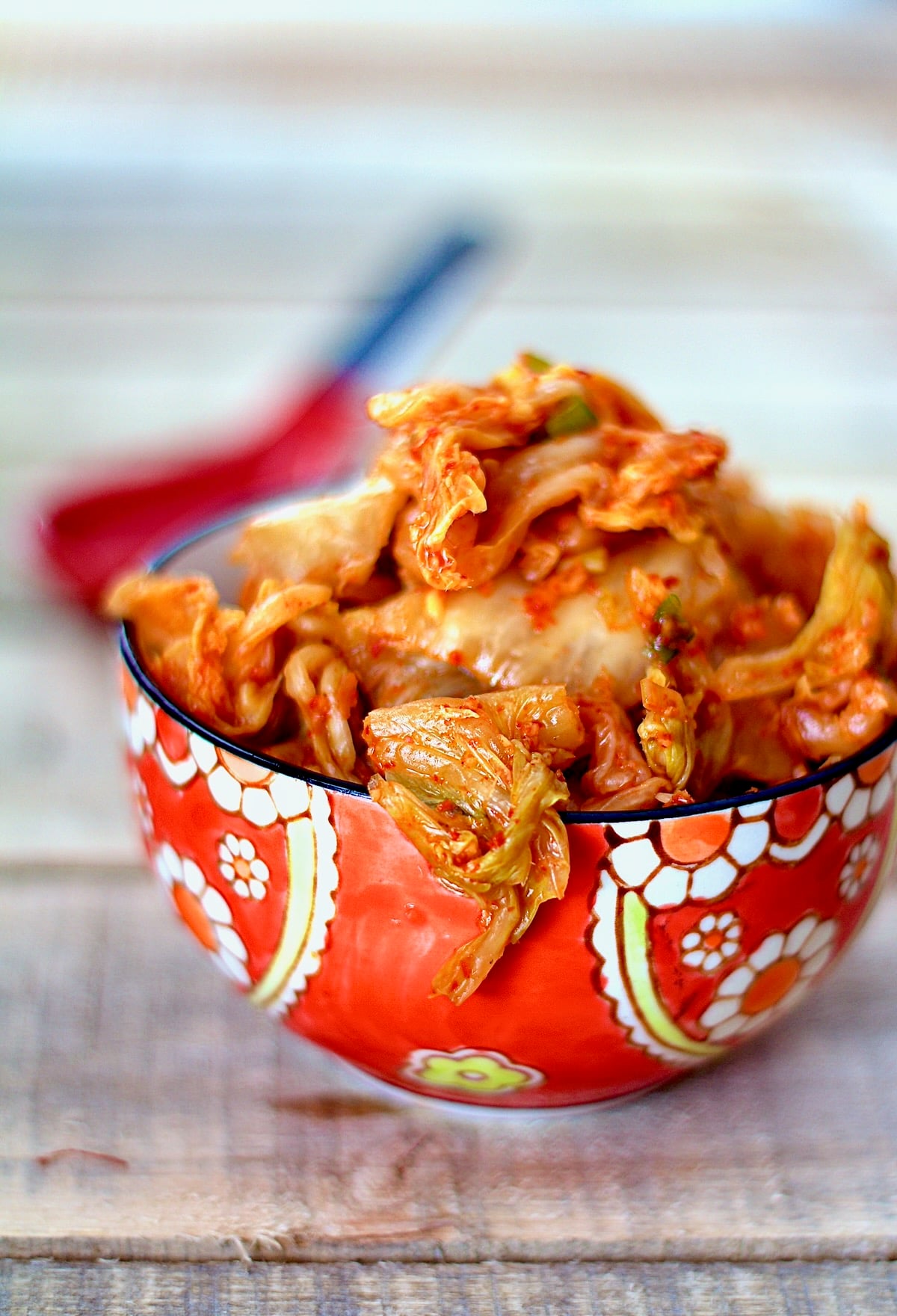 Easy Homemade Kimchi in red bowl.