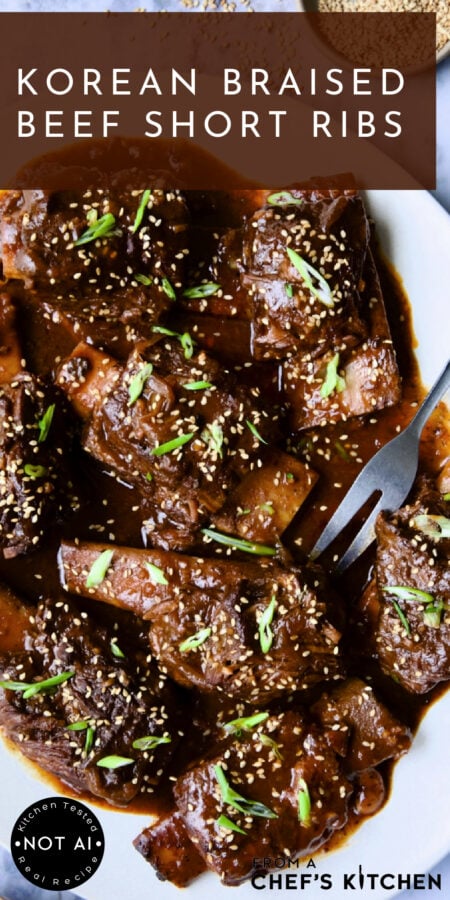 Pinterest graphic for Korean Braised Beef Short ribs showing them on a white platter with meat fork.