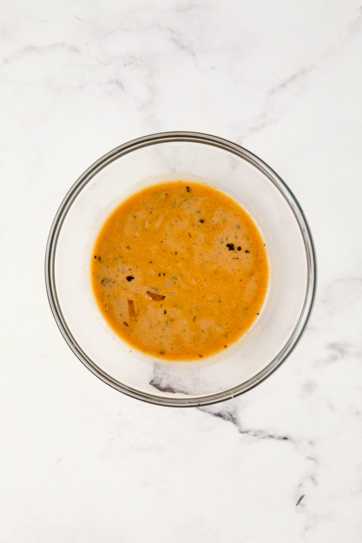 Slurry for short ribs in glass bowl.