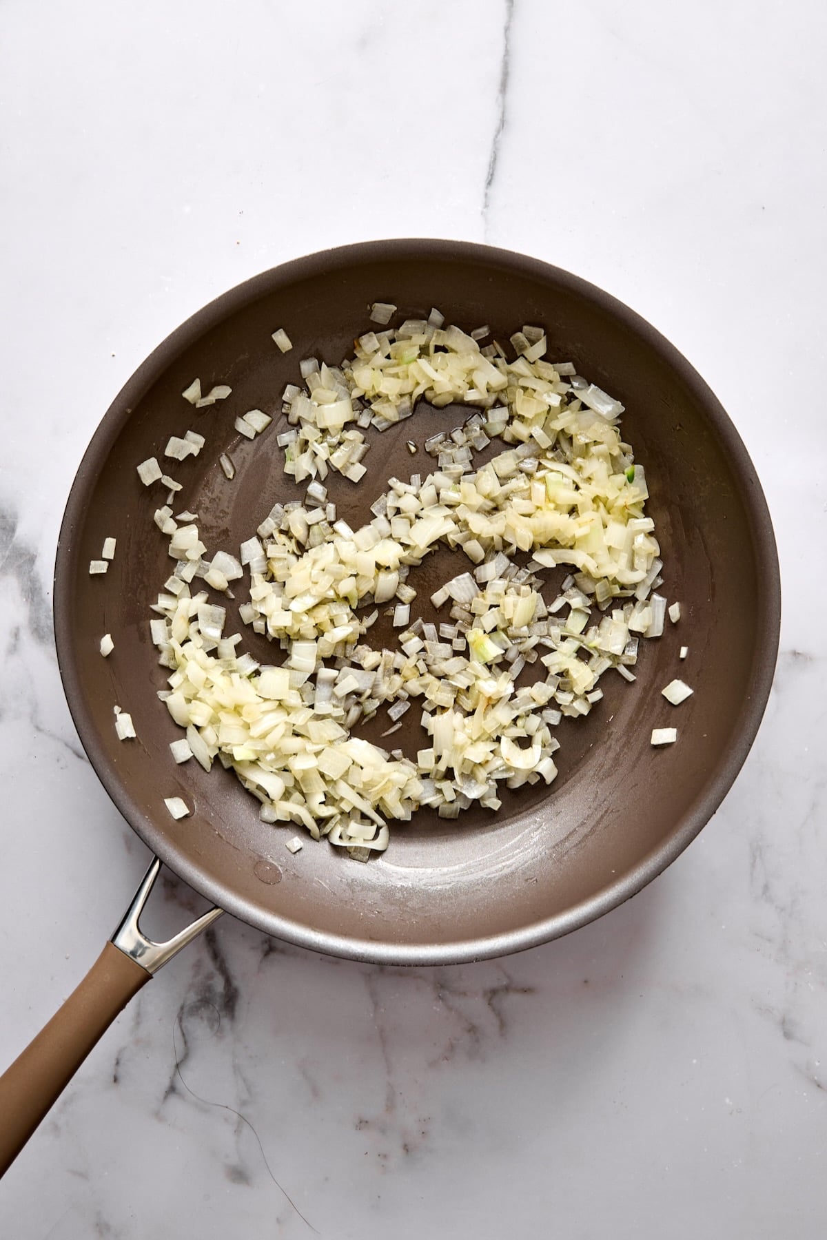 Cooked onions in nonstick skillet.