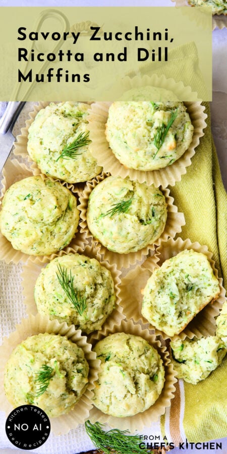 Pinterest graphic for Zucchini, Ricotta and Dill Muffins showing them on a napkin-lined basket with one broken into three pieces.