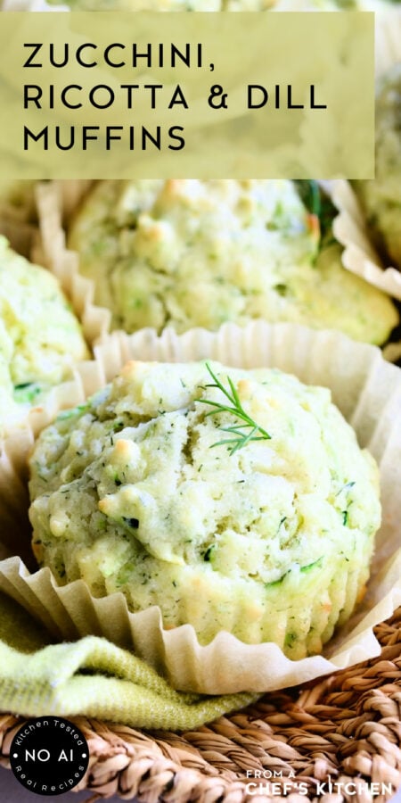 Pinterest graphic for Zucchini, Ricotta and Dill Muffins showing one on a napkin-lined basket.