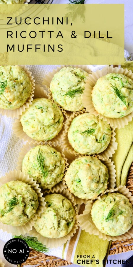 Pinterest graphic for Zucchini, Ricotta and Dill Muffins showing them on a napkin-lined basket.