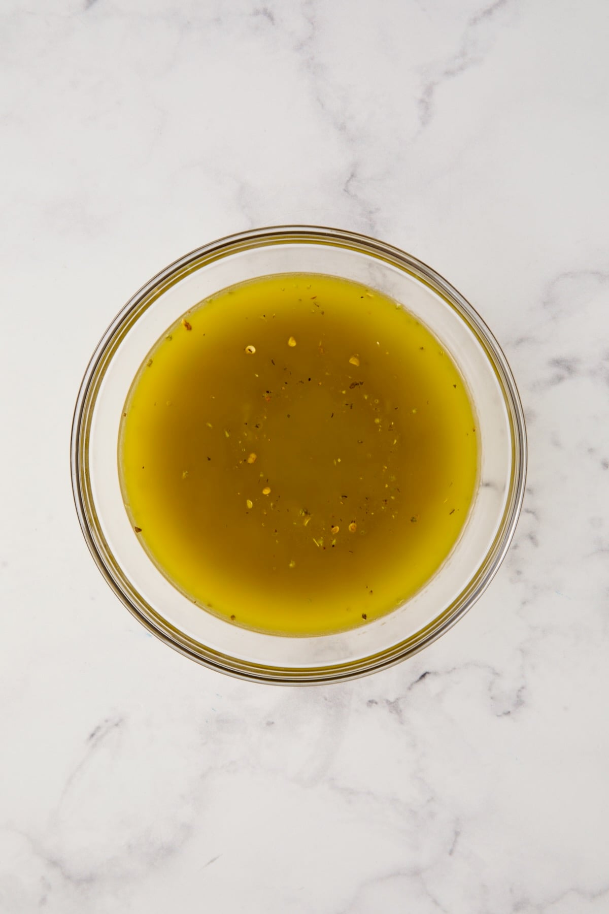 Vinaigrette in glass bowl.