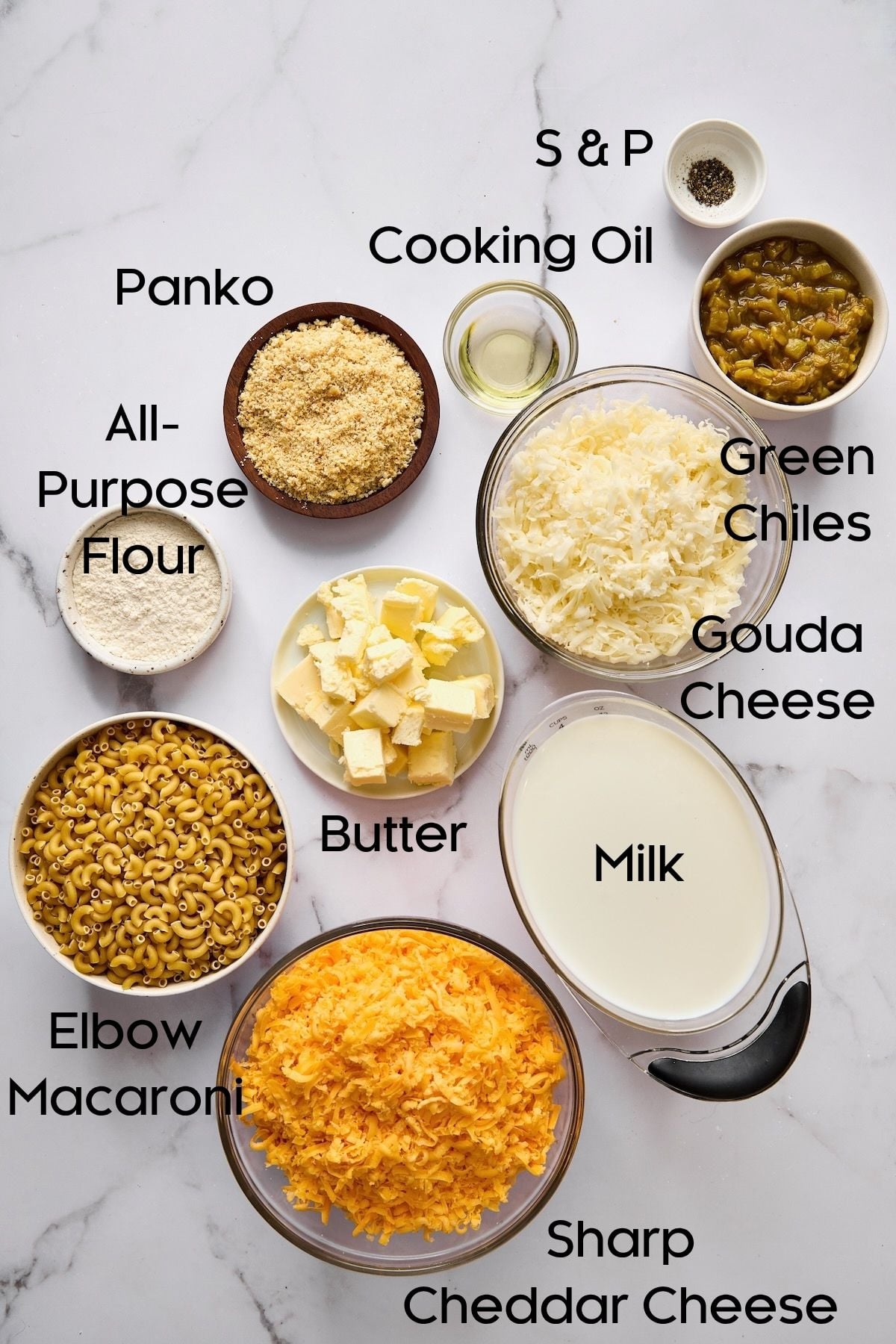 Ingredients for Hatch Green Chili Mac and Cheese in various bowls and containers.