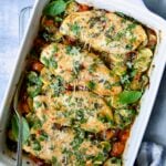 One-Pan Italian Chicken and Vegetables in white rectangular baking dish.