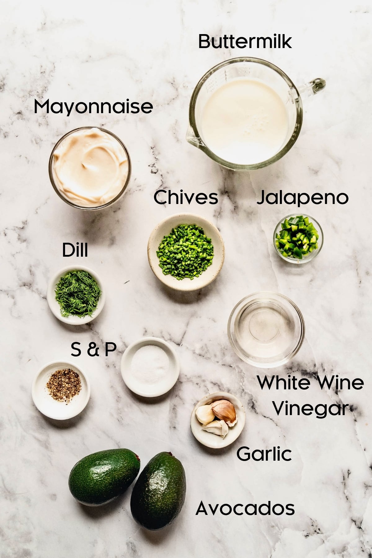 Ingredients for avocado dressing for Chicken BLT Salad in small bowls.