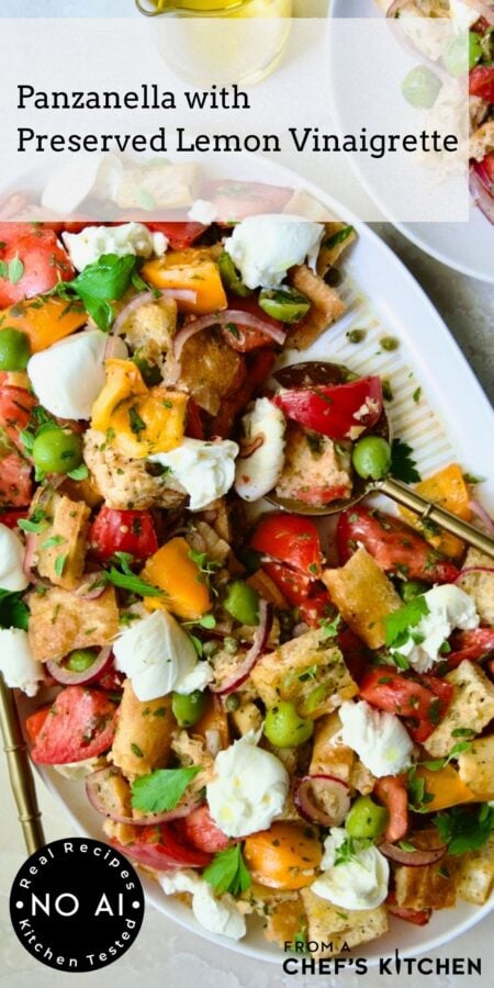 Pinterest graphic for Panzanella with Preserved Lemon Vinaigrette showing it on a white oval platter with gold serving utensil.