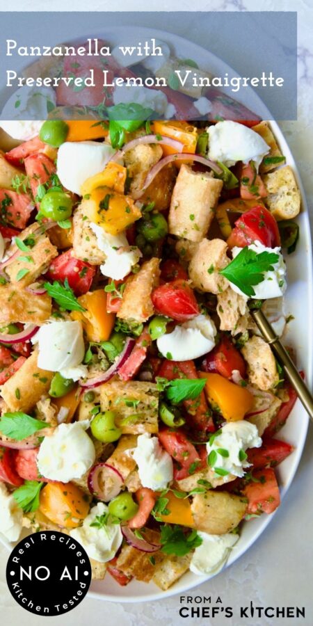 Pinterest graphic for Panzanella with Preserved Lemon Vinaigrette showing it on a white oval platter with gold serving utensil.