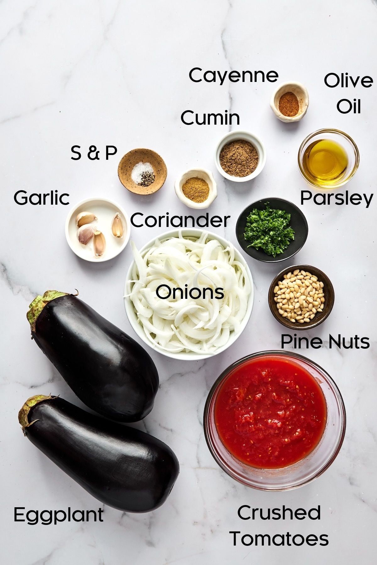Ingredients for Turkish Eggplant Casserole in small bowls.