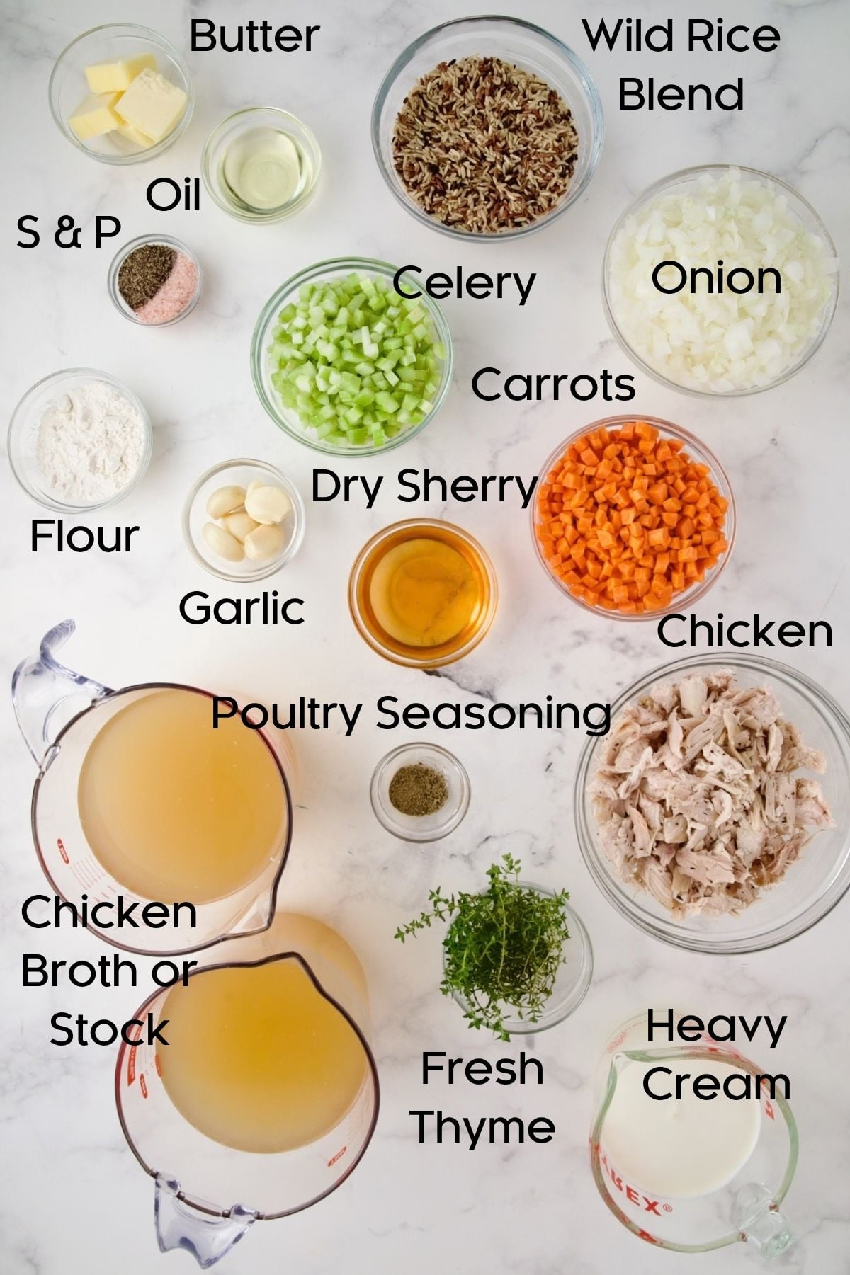 Ingredients for Creamy Chicken and Wild Rice Soup in glass bowls.